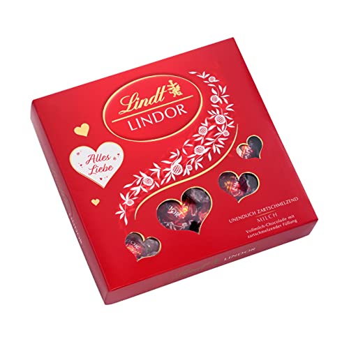 Lindt LINDOR Präsent mit Herz Cutouts, feinste Vollmilch Schokolade mit unendlich zartschmelzender Füllung, 1er Pack (1 x 187 g)
